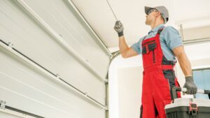 technician working on garage door