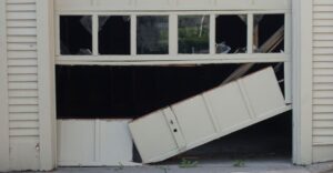 Damaged garage door.