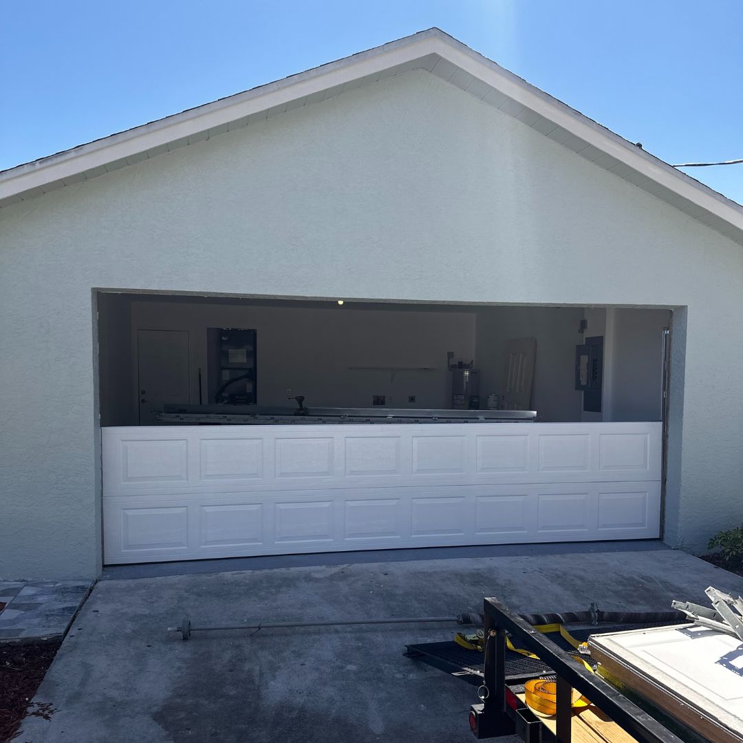 the exterior of a partially open garage door