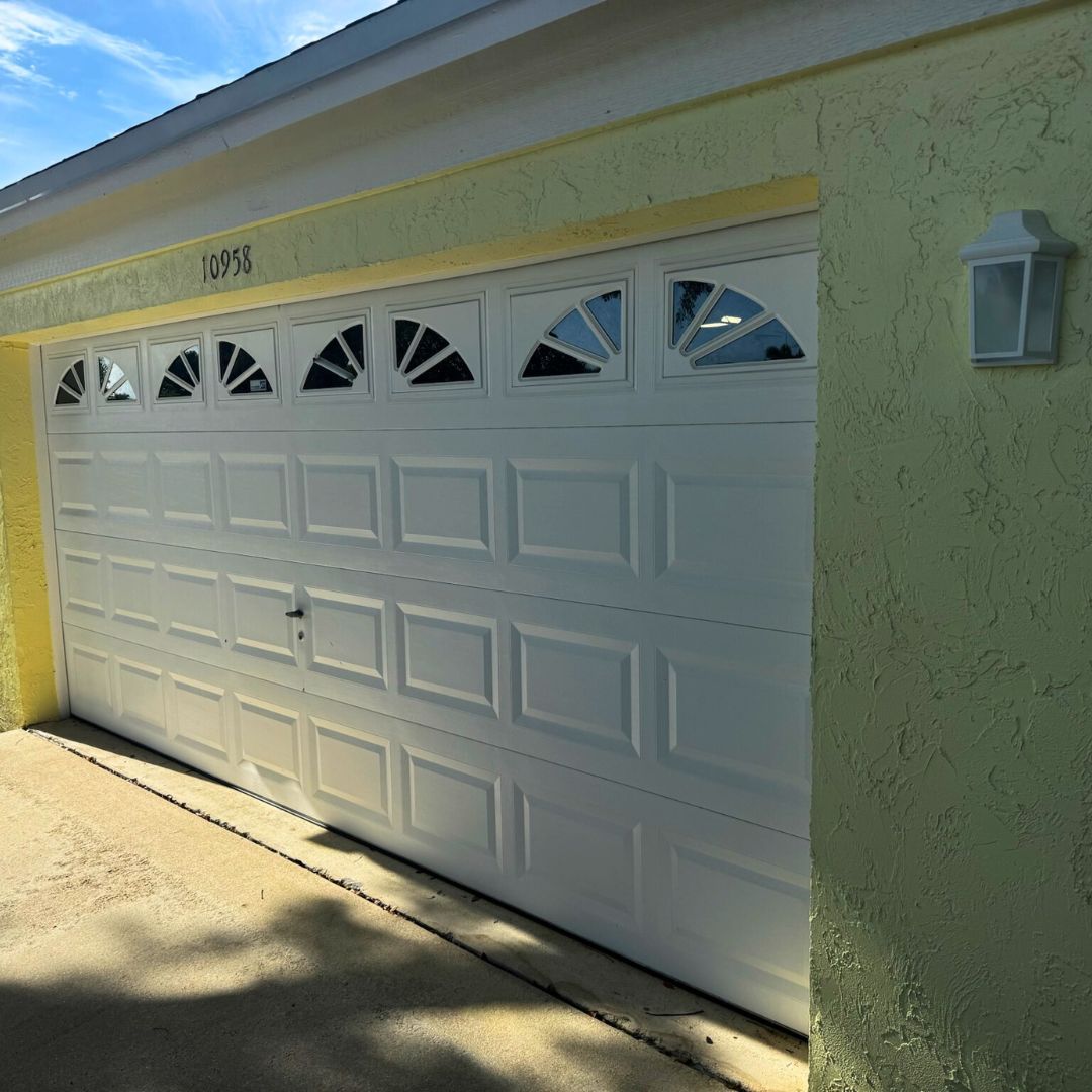 home with repaired garage door