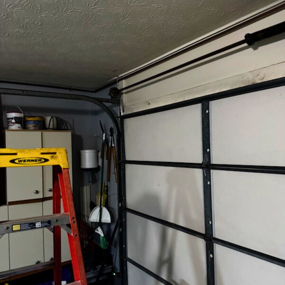 repairing a garage door