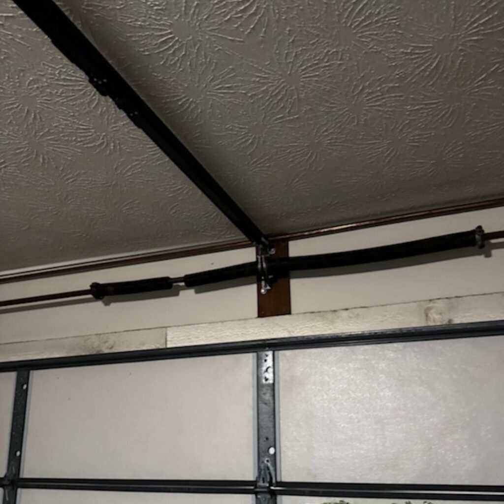 broken garage door spring