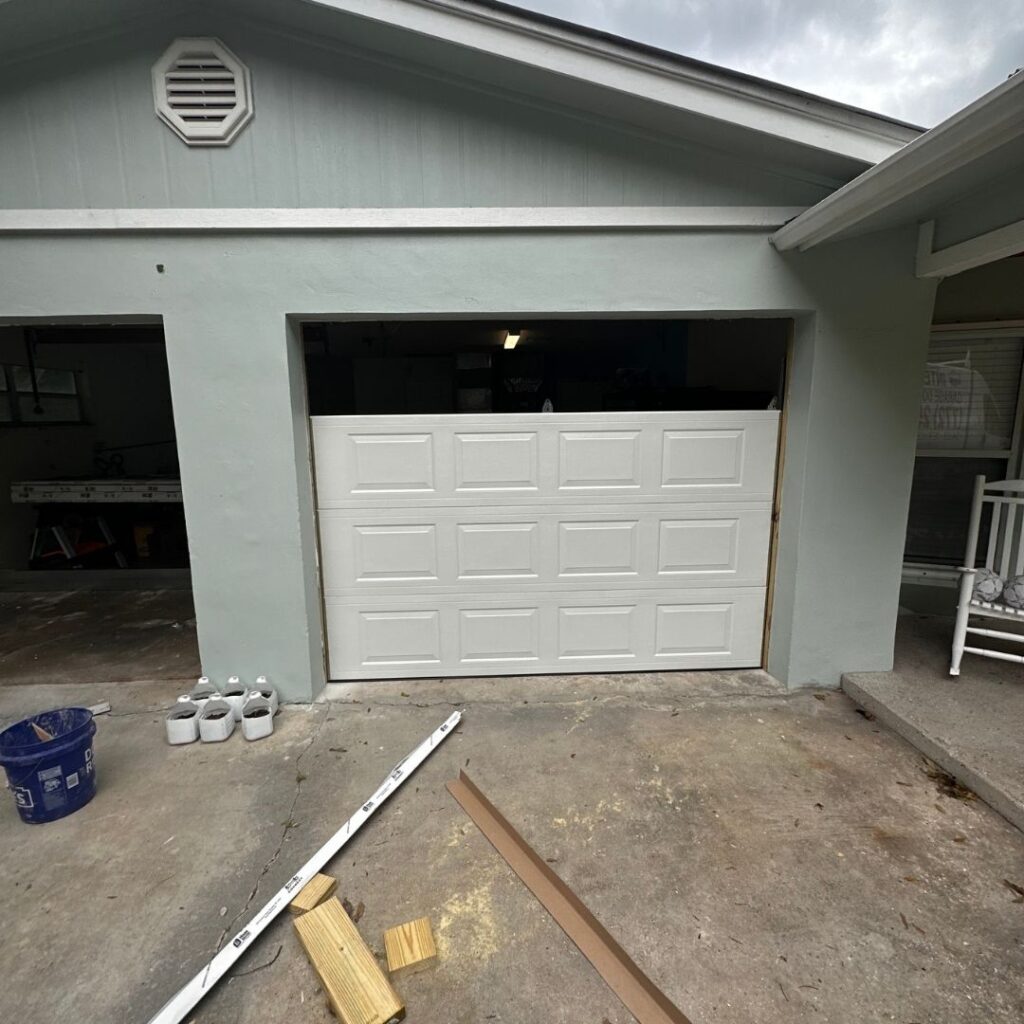 garage door panel repair and replacement