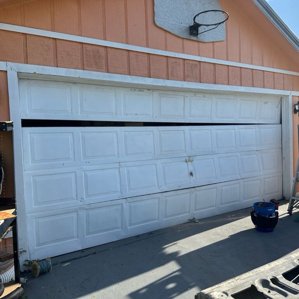 broken residential garage door panels